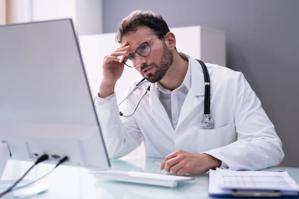 Frustrated clinician - illustrates alarm fatigue